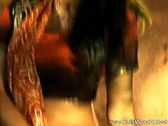 A beautiful brunette milf from Bollywood India dances solo in high definition, captivating her friend with graceful moves.