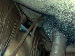 ebony performer in oral scene with facial