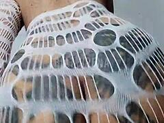 Tattooed brunette intensely dancing funk with bold moves