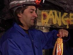 Deep inside the mine, brunette and blonde milfs are joyfully waiting to have group sex with the miners?