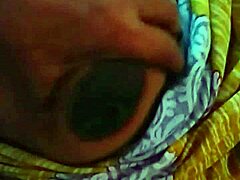 Indian wife feels deep pleasure as she enjoys her pussy and boobs being caressed. Her emotions overflow with passion during intimate moments.