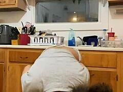 Anna Maria, the mature Latina, is dancing and doing dishes in part three