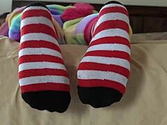 Asian cosplayer strips socks in a voyeur fetish session with ripped clothes