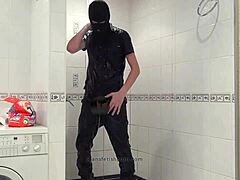 Master Washes Feet In Blue Jeans