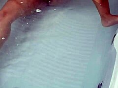 The sexy pornstar masturbates in the hydro massage bathtub, moaning as she touches her boobs and cock!