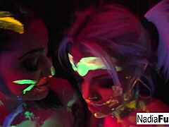 Black-light babes Nadia White and Ophelia perform