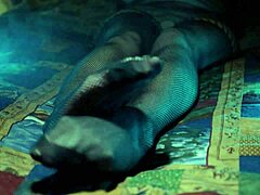 Perfect toes teasing in sexy fishnet stockings.