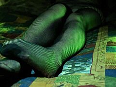 Perfect toes teasing in sexy fishnet stockings.