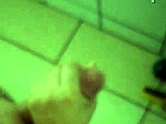 Witness intense solo action in the bathroom.