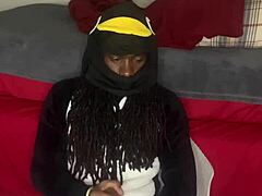 Guccicapone in onesie gives handjob to big black cock, leading to explosive cumshot in homemade scene