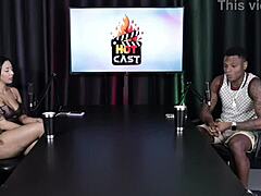 Will mastro strips in sheer red lingerie for glamour shoot