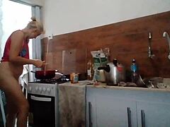 Stella cooking naked in the morning, showing big tits everywhere!