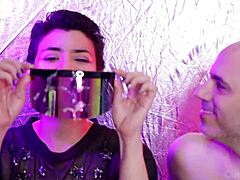 Retro futuristic babe licks cum off colorful glasses hard.