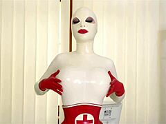 Busty latex lucy spanks her ass & fills her creamy pussy with clinic sex toy