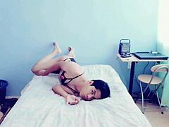 this hot young gay guy feels himself up in his room