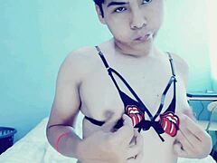 this hot young gay guy feels himself up in his room