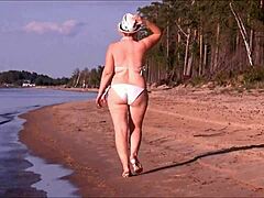 Juicy Mature Milf Flaunts Big Ass in White Bikini for Homemade Fun.