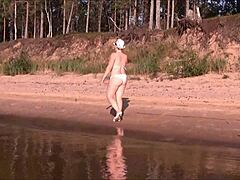 Juicy Mature Milf Flaunts Big Ass in White Bikini for Homemade Fun.