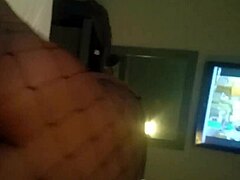 Ebony woman rides in cowgirl position