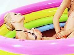 Cheerful Babes Finger Each Other in Jello-Filled Pool Fun