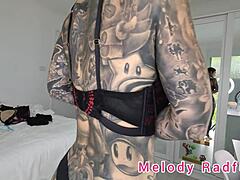 melody radford stuns in black and purple lingerie during sexy micro bikini haul