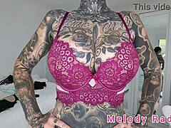 melody radford stuns in black and purple lingerie during sexy micro bikini haul