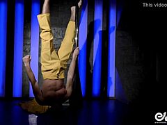 Hot gay strip tease with acrobatic moves and pole dancing