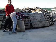 Outdoor couple bangs hard on a public log
