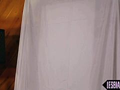 This cute lesbo babe gets her pussy licked out by her girlfriend in stockings.