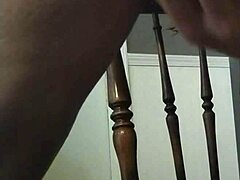 Homemade video of girl with hairy pierced pussy riding dildo anally.