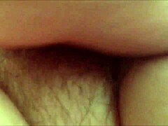 Horny amateur MILF rubs her hairy pussy in homemade masturbation session
