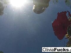 olivia's having a blast nude in the pool, join her!