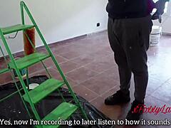 Unfaithful Wife Interacts with Painter While Husband Works