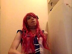 Redhead crossdresser's solo performance with a happy ending