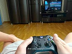 Naughty step sister gives sloppy blowjob to stepbrother while he plays xbox
