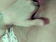 gostosa showing off perfect breasts while fingering tight brazilian pussy in close-up