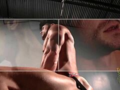 Intense rim chair action with bound gay stud under total control