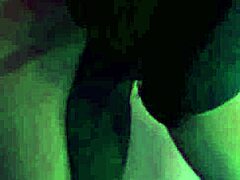 Milf in green shirt teases in room