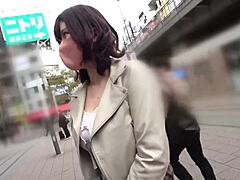 Watch this cute Asian babe suck big tits.