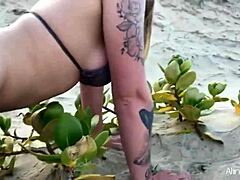 I watch this blonde girl bent over on the beach, her big ass gaping from sex.