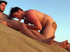 Skinny twink gets beach blowjob on gay nudist shore. Almost caught!