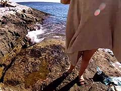 BBW Woman with Natural Features Enjoys Public Nudity in Relaxed Setting