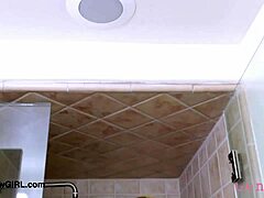 lovely teen brunette enjoying a refreshing shower