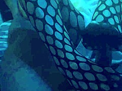 Sexy woman gives detailed footjob using nylons and leggings on cock