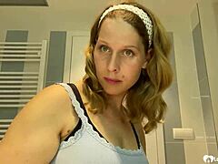 Mom next door flaunts her tits for fun.