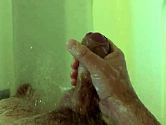 Masturbation at the shower turns into a steamy solo session