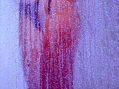 college tanned gorgeous girl feels relaxed taking a shower in her bikini