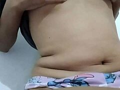 Young woman touches herself horny