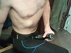 Stretching With Massage Gun With Compression Tights And Brace Bound