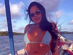 brazilian latina wife rides in bikini on boat